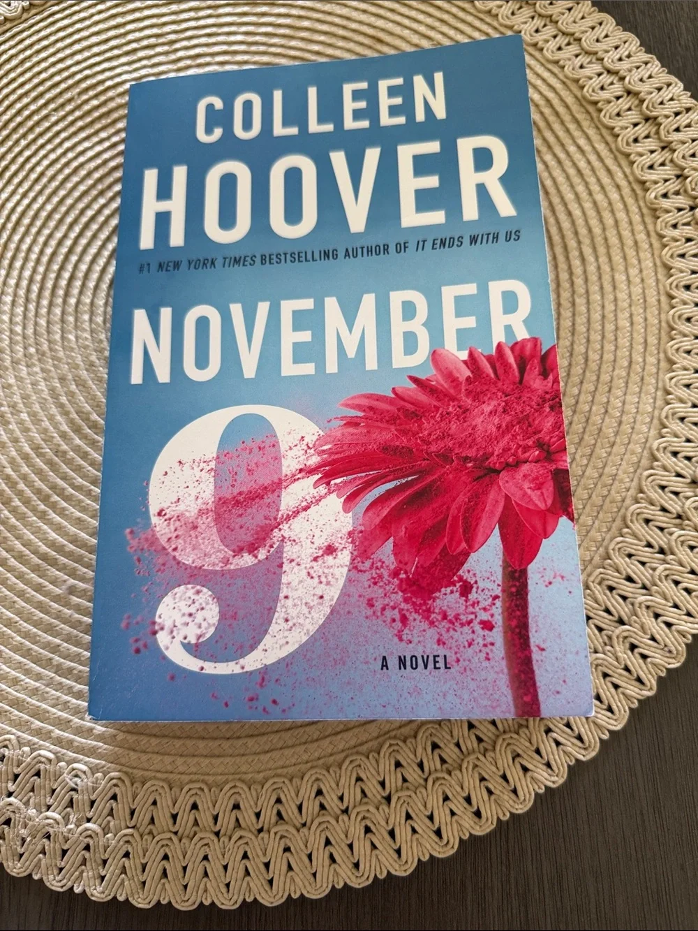 November 9 Paperback Novel - Blue Cover with Pink Flower